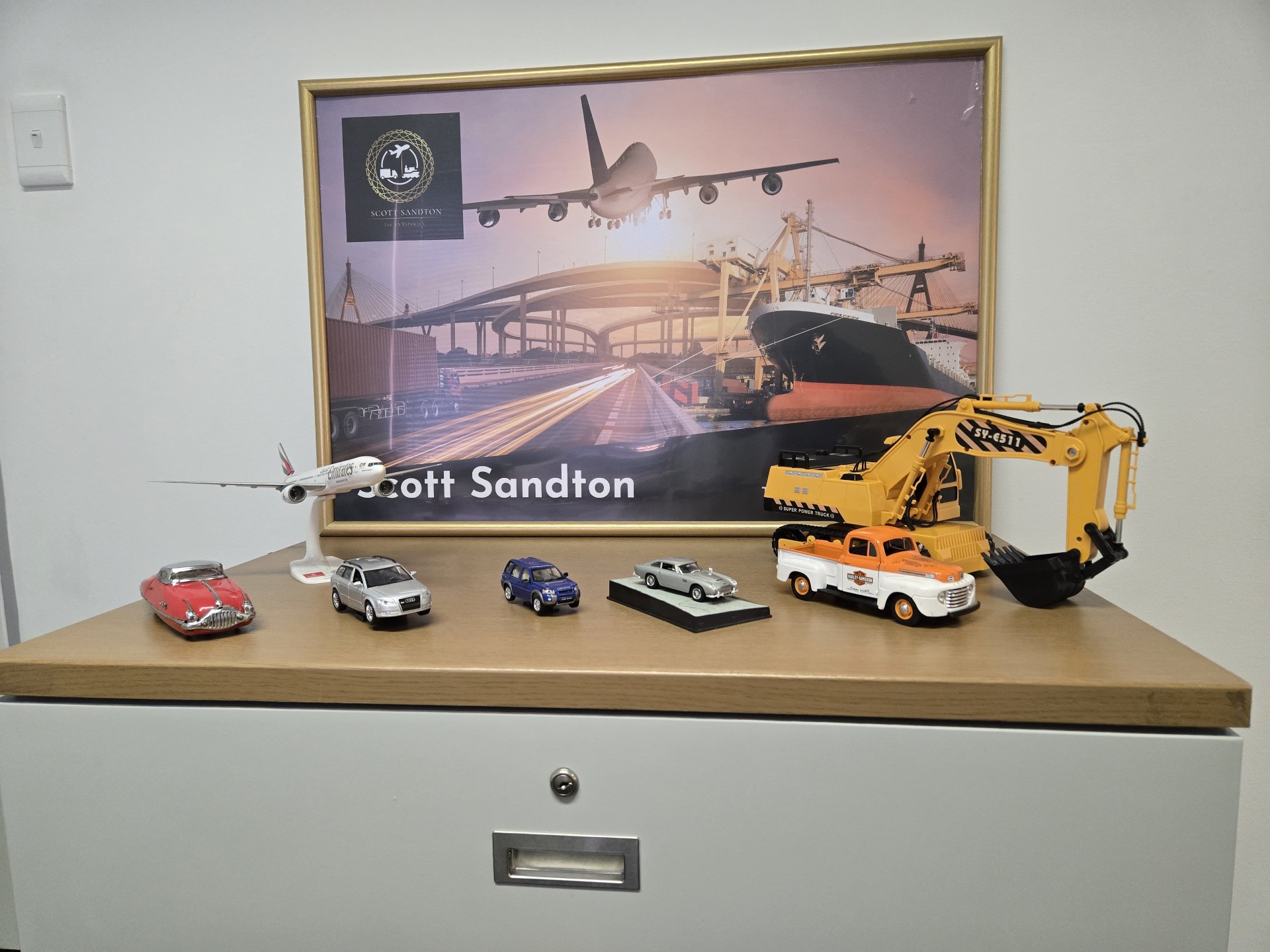 Model vehicles and aircraft on display at the Scott Sandton office