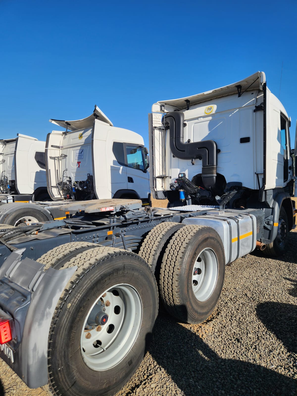 Fleet of Scania truck tractors lined up for export