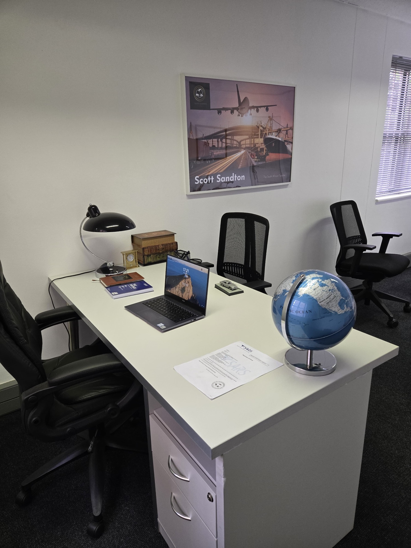 Scott Sandton Sandton office desk with export paperwork