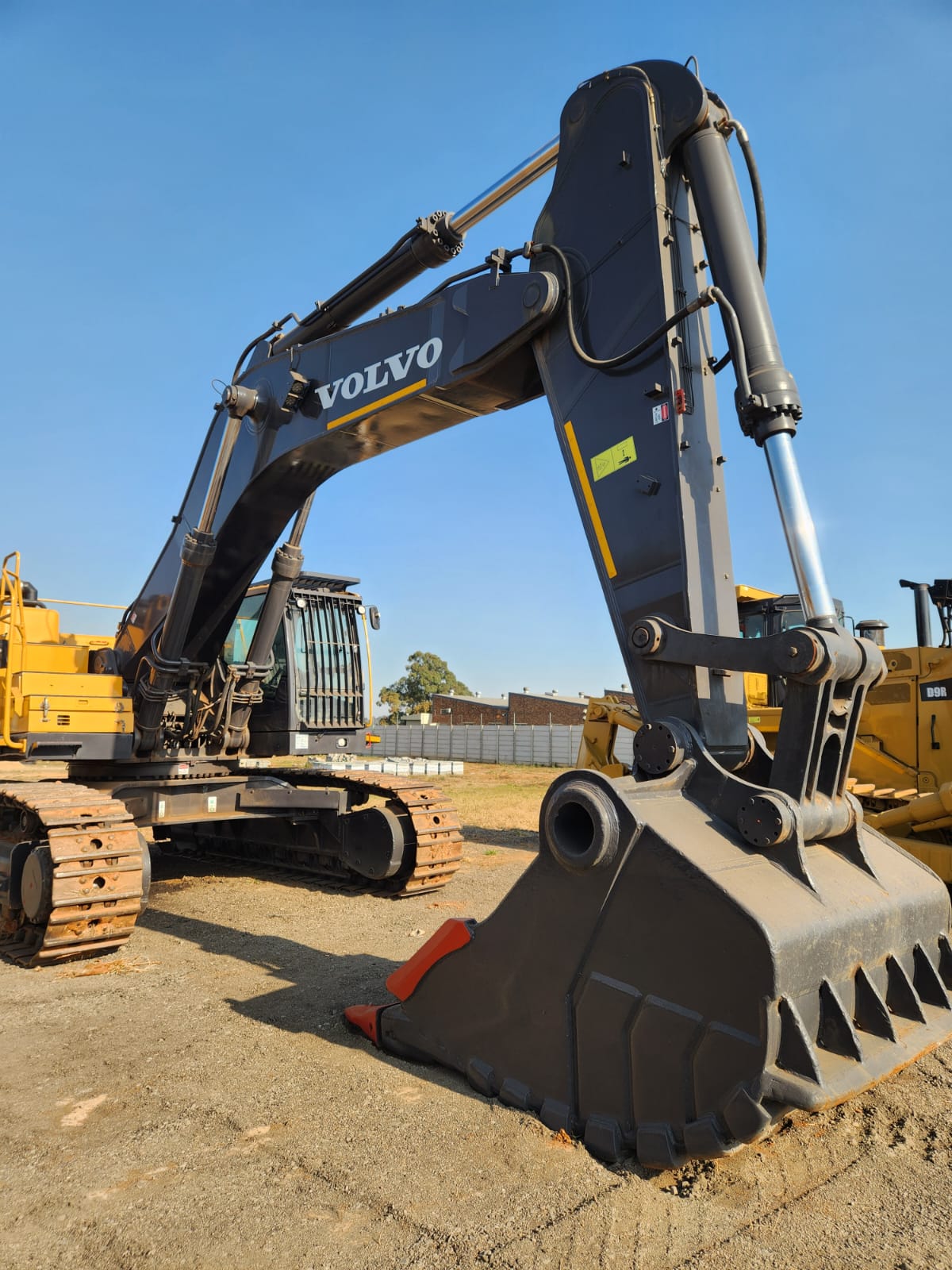 Volvo excavator boom and heavy-duty bucket close up